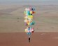 Британец пролетел 25 км над Африкой на сотне воздушных шариков